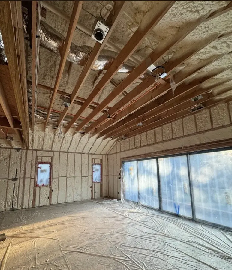 Interior walls and ceiling insulated with spray foam during new construction in Sandersville